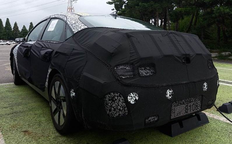 http://i2.dd-img.com/erp/f0a81854c6140f2f7dd4bbee5dd0793e.jpg hyundai-ioniq-6-spied-in-out-4.jpg
