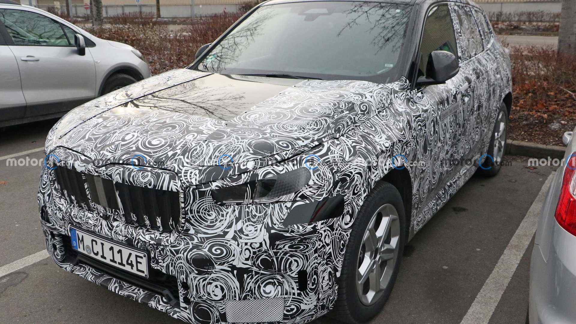 https://i2.dd-img.com/cms/1d638e67614a86ceacb4839b72f64696.jpg new-bmw-ix1-spy-shots (1).jpg
