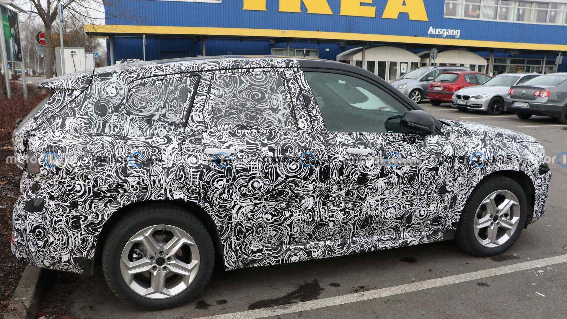 https://i2.dd-img.com/cms/97b03edc7be631c579a22cd5a8777391.jpg new-bmw-ix1-spy-shots (3).jpg