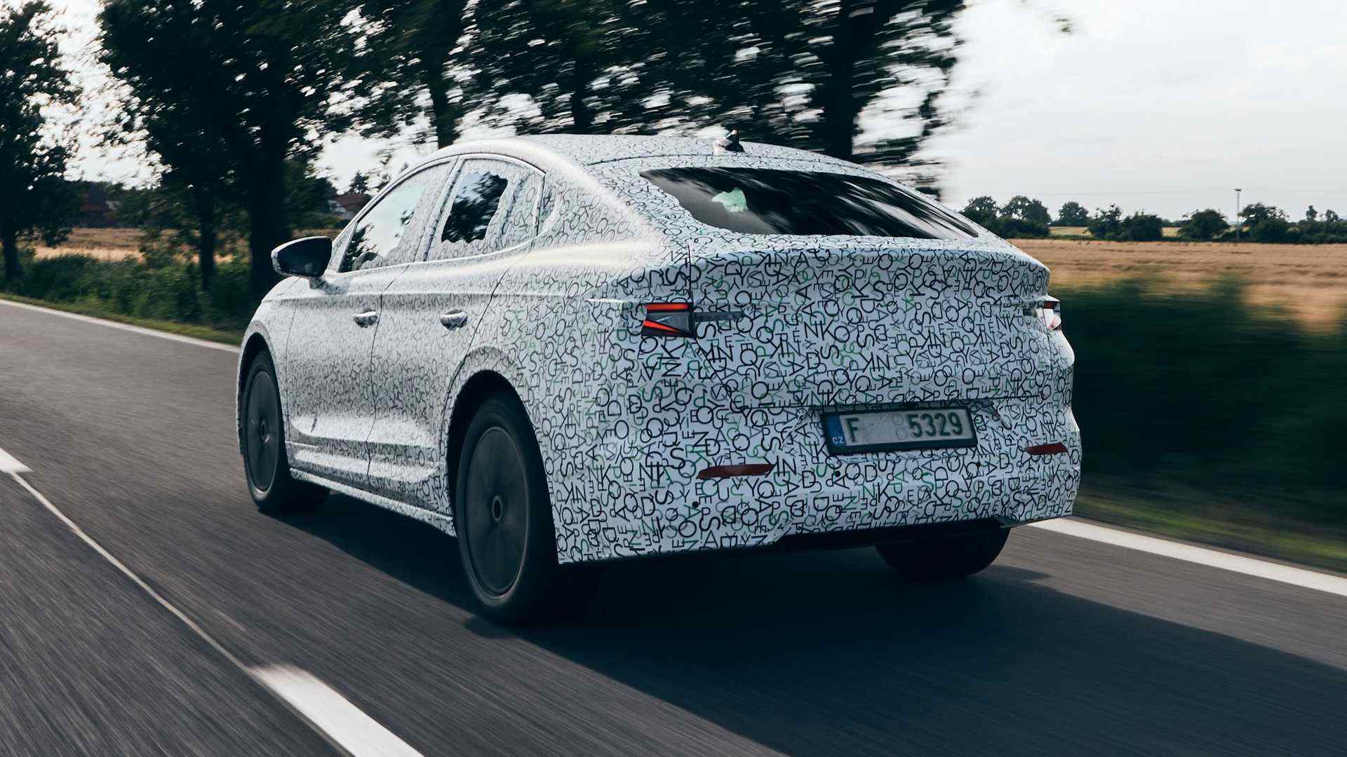 https://i2.dd-img.com/cms/c912d40be2250eecfb2ef776e27e66e9.jpg 对对skoda-teases-enyaq-coupe-iv-teasers.jpeg